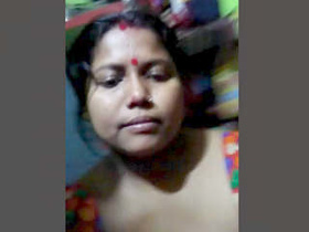 Indian woman flaunting her breasts and vagina