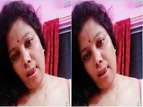 Busty Desi Budi reveals her assets in steamy video