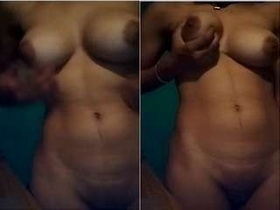 Indian girl flaunts her breasts and vagina