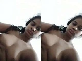Pretty Sri Lankan girl flaunts her large breasts