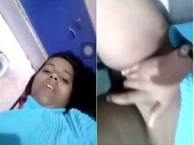 A cute Indian girl captures her own hand selfies