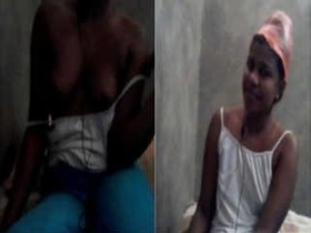 A beautiful Sri Lankan woman revealing her breasts and taking a bath