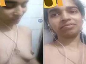 Indian woman reveals her XXX-rated breasts and masturbates with her hand