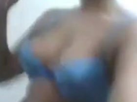 Tamil babe in a bra teases with her big tits