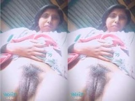 Nepali girl's pussy explored in explicit video