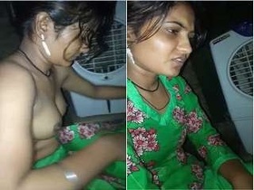Desi girls enjoy each other's breasts in cute rural setting