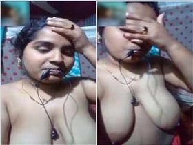 Shy Desi Budi flaunts her breasts for her partner