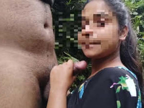 Tamil girl performs oral sex in public and receives a facial