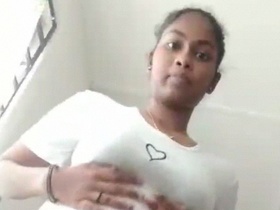 Tamil hottie strips down and pleasures herself with her natural pussy