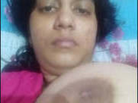 A busty Indian woman flaunts her assets