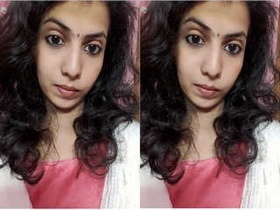 A South Indian girl flaunts her breasts and genitals