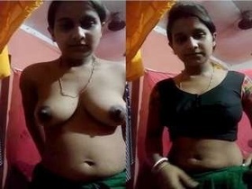 Desi boudi strips down to reveal her ample bosom and intimate area
