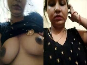 Desi Bhabha's seductive gaze and her bare breasts in a steamy video