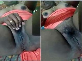 Desi bhabhi flaunts her breasts and pussy in a steamy video