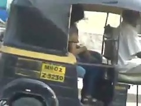 Desi couple indulges in public kissing in auto