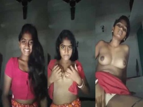 Attractive young Indian homemaker shows her bare body parts
