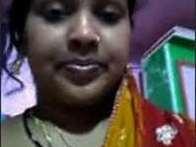 Desi bhabhi takes a bath while masturbating in this video