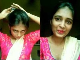 Attractive Indian woman fondles her breasts and vagina in part 5