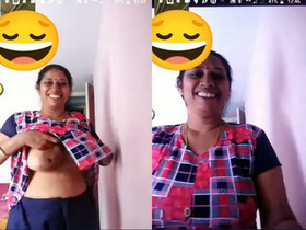 Amateur Indian babe flaunts her big tits and wet pussy