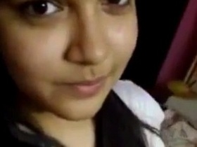 Indian girl with fake boobs gets naked in a solo video