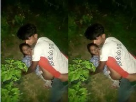 Desi couple's steamy sex session behind the door