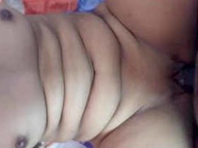 Wife moans with pleasure as she gets fucked by her husband