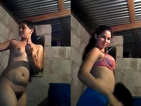 Cute Indian girl shows off her body in a bathtub