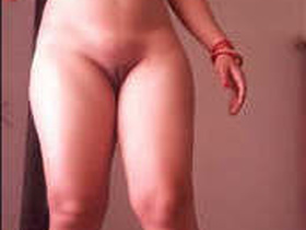 Naked desi woman standing with spread legs