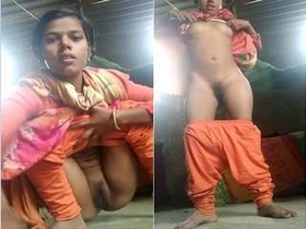 Exclusive video of a rural girl baring her breasts and pussy