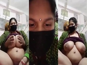 A video of a bhabhi with big breasts having sex on camera with her attractive partner