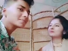 Romantic couple shares a kiss in a restaurant