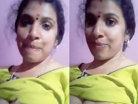 Indian wife shows her breasts in front of the camera