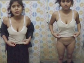 Indian girl bathing in the bathroom