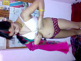 Indian bhabhi's lingerie change captured on film