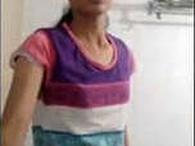 Indian girl pleasures herself with fingering and boob play