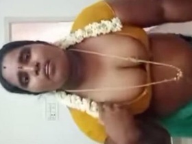 Indian woman with large breasts enjoys sexual pleasure