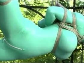 Outdoor BDSM action with latex bondage and fucking