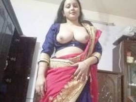 Desi girl shows off her perky breasts for the camera