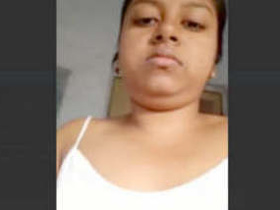 Indian girl with large breasts records video for boyfriend