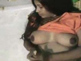 Indian porn video featuring Aarzu bhabhi's big tits and wild sex