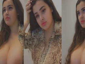 Big-breasted Indian girl flaunts her assets in a seductive selfie video