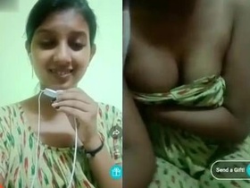 Indian bhabi flaunts her ample bosom on camera