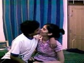 Teen couple enjoys foreplay and kissing in Mumbai home