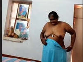 Mature Tamil Aunty in Cloths