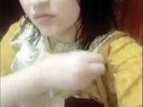 Enjoy the beauty of a young girl with perky breasts