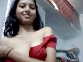 Busty bhabi strips for her lover in a steamy video