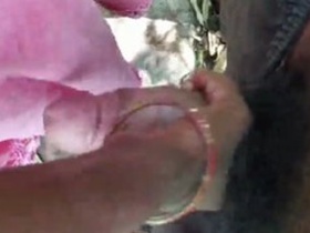 Desi couple enjoys outdoor handjob session