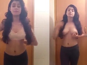 Stunning teen strips naked in the bathroom