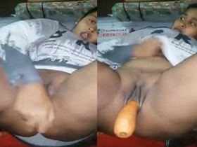 Tamil girl pleasures herself with carrot in steamy video