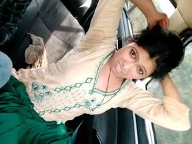 Teen couple gets naughty in the backseat of a car